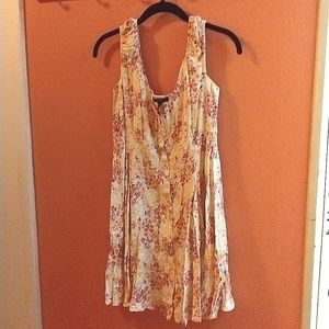 Forever 21 brand, size small, light yellow dress w/ pink flowers